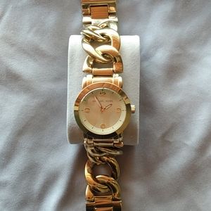 Michael Kors gold chain watch.